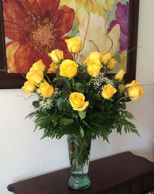 Two dozen yellow roses will brighten anyone's day!