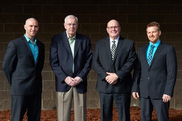 From left to right: Jeremy Lewis, John C. Lewis, John A. Lewis, Benjamin Lewis