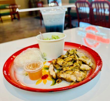 Chicken Satay Plate with cucumber salad and sticky rice.