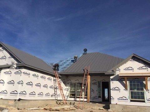 Jose , &&' Team working on the roof.