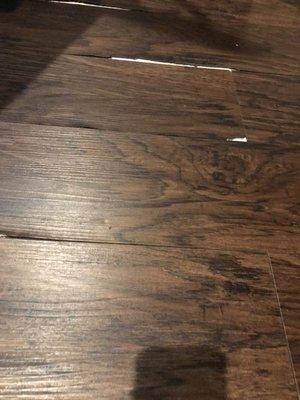 Peeling off wood vinyl flooring