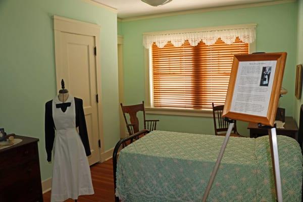 Typical Harvey Girls living area and a display of their uniform