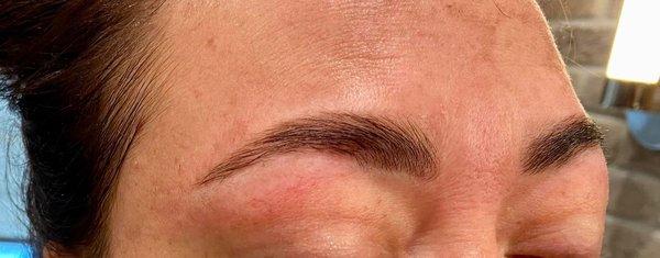 After brow lamination, wax and tint