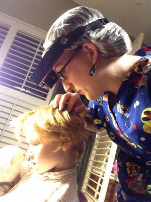 LiceDoctors technician Trudy treats her client and makes sure all of the nits and lice are out of the hair.