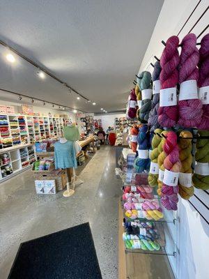 Local Maine yarn selection displayed as you walk in