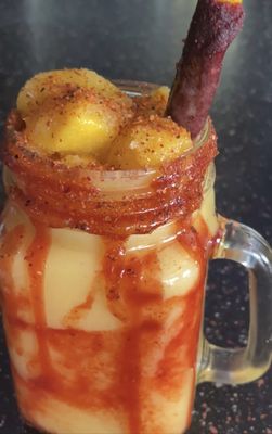 Mango, chamoy & Tajín. The straw has tamarin.