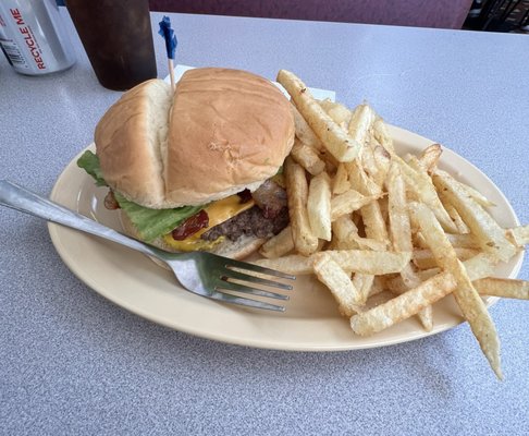 Large cheeseburger add bacon with a small side of fries