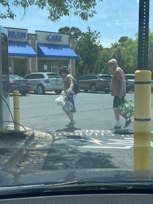 These two old self entitled old people parked blocking an EV spot and were totally dismissive.