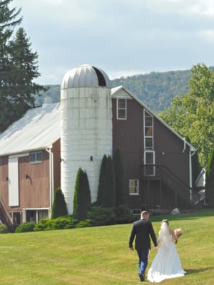 The walk from the ceremony space to the reception in the barn.