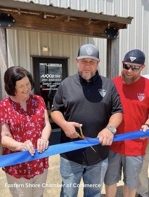 Scott Dunston owner cutting the ribbon