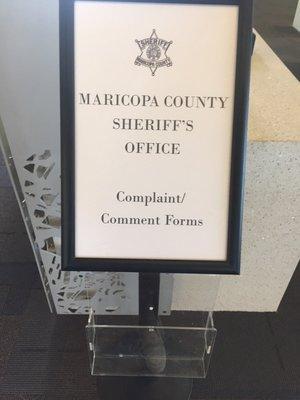 Maricopa County Sheriff's office complaint forms near entrance to the left upon entering