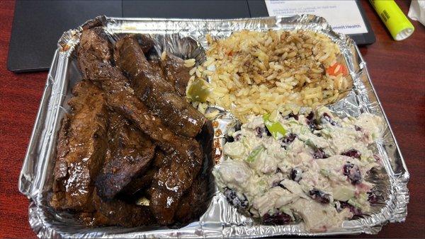 Steak, rice pilaf and chicken craisin salad