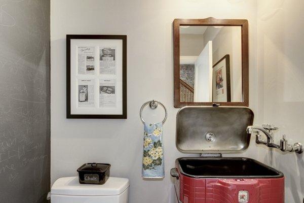 Can you believe this is a salvaged roaster? We worked closely with the own to make it the standout feature of this charming powder room.