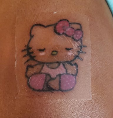 Hello Kitty. My very first day of my Tattoo. I left a Happy customer.