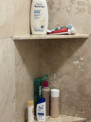 They left the toothbrush and toiletries in the shower, so one can assume the shower was not cleaned either.