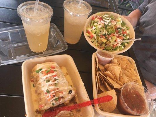 Taco Salad and a Steak loaded Burrito w/ Queso, chips and homemade salsa and Arnold Palmer's