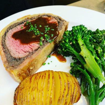 Beef wellington with hassle back potato and baby broccoli