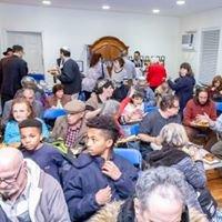 Community enjoying  Chanukah  party .