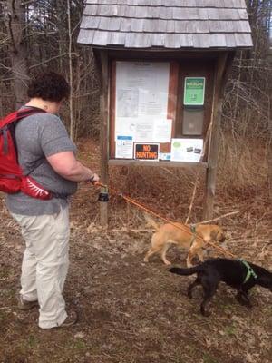 The girls and me at the trail head kiosk planning our 4.68 mile hike.