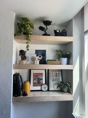 Right side of floating shelves with some Knick knacks