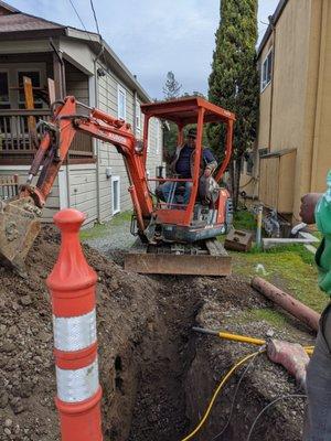 Sewer Lateral trench to building clean out. Dug in half a day.