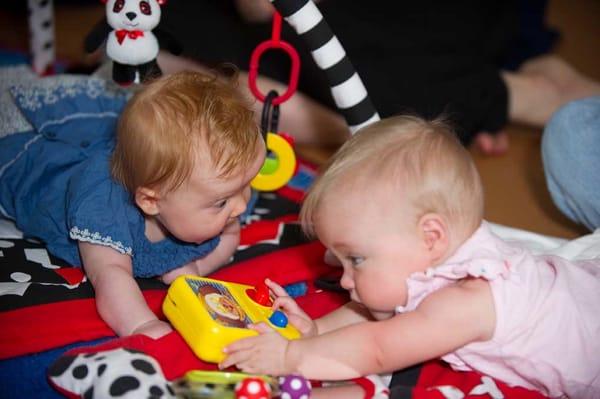 Babies having fun in class.