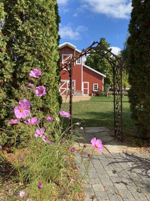 Wildflowers, archway, and barn where you can get married.