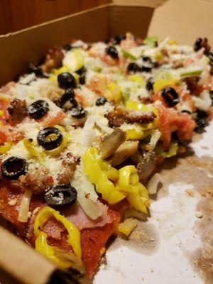 This is what you call quality pizza.  Fresh and clean toppings.