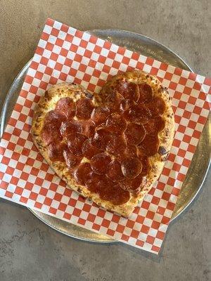 Show your love this valentines day with a Heart shaped Pizza!