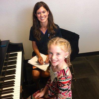 One of our fabulous piano teachers with one of her students!