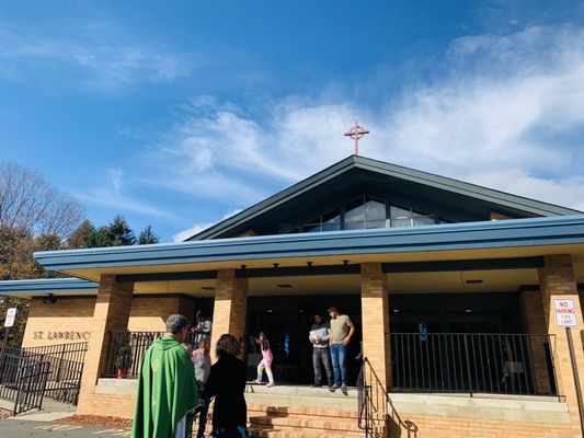 Father Nick greeting after Sunday Mass :)