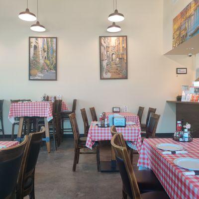 The interior of the restaurant, lots of places to sit if you wish to dine in.