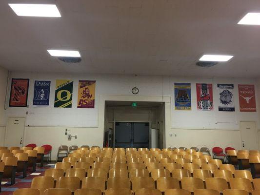 College banners in the auditorium.