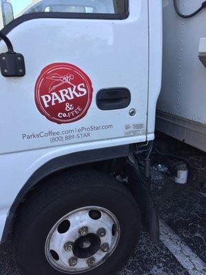 Here is the Parks Coffee emblem on the illegally parked truck with Parks' phone number