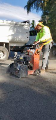 Saw cutting asphalt for repair in Yuba City CA