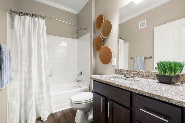 Bathroom with walk in shower and tub at Estancia at Ridgeview Ranch