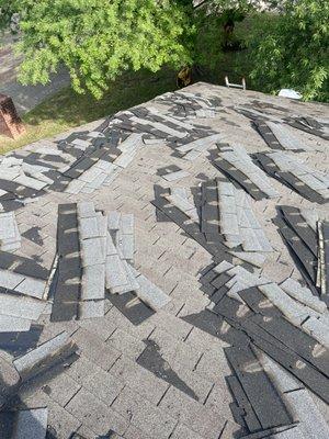 Old shingles being removed