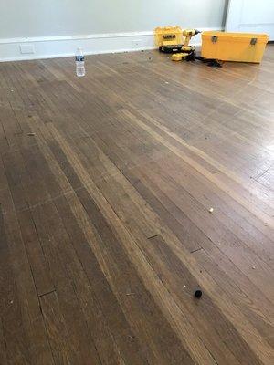 Damage to hardwood floors by Movers & Co