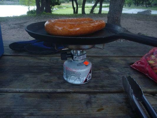 Dinner the backpackers way,  Tri-fuel and and...  OK, no...  backpackers carry cast iron! :-)