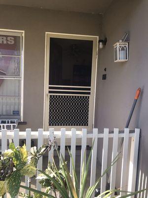 New swinging screen door installation