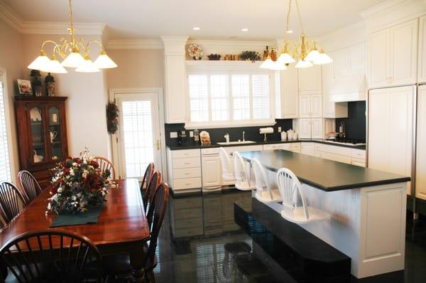 High gloss white painted maple- granite counter tops with suspended bar stools- Draper, Utah