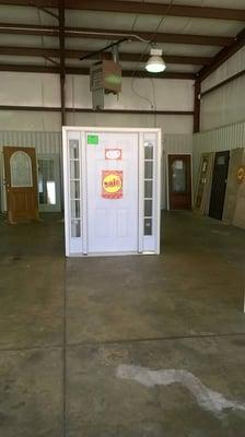 Contractors Special $399.00 Comes with 6 panel steel door, clear side lites and a paint grade frame.