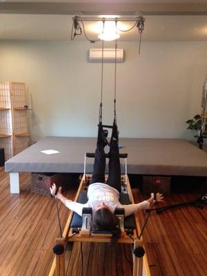 Using the Bohdi Suspension system and the reformer together  for support of the legs in C5/6