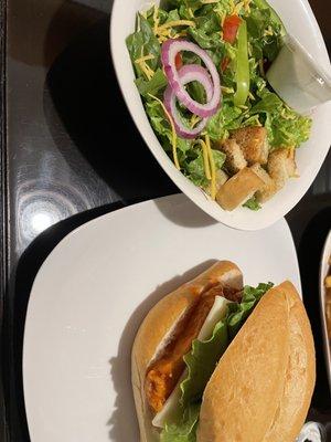 Buffalo chicken sandwich and side salad