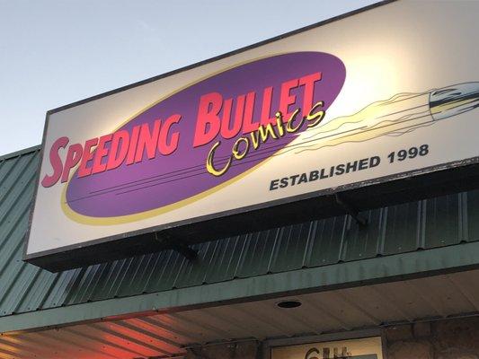 Storefront of Speeding Bullet Comics in Norman, OK.