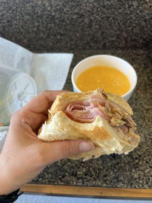 Cuban sandwich with mango/orange juice