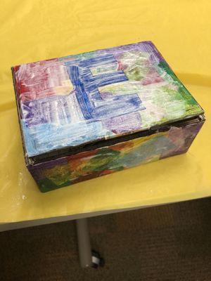 Mod podge tissue paper on box.