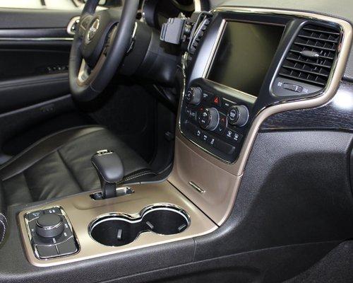 2014 Jeep Grand Cherokee Interior/exterior detail. Exterior road tar removal, clay bar treatment, paint sealant applied, engine bay detailed