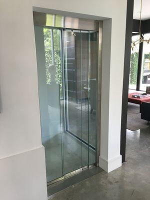 home elevator with glass door