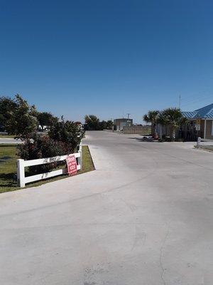 Notice we are fully concreted and each space has its own grass yard